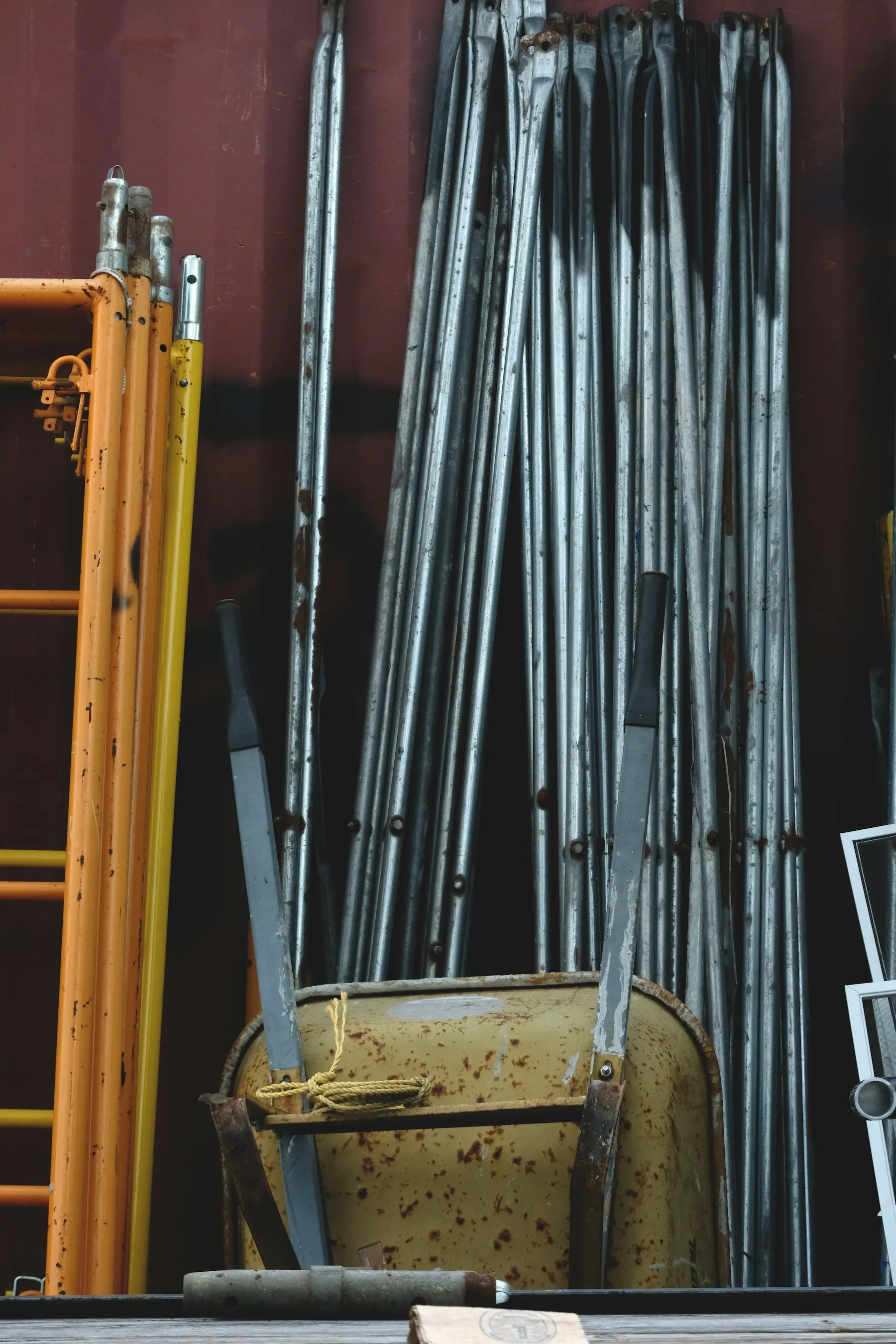 Scaffolding materials stacked and stored for handling
